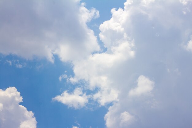 The blue sky has white clouds.