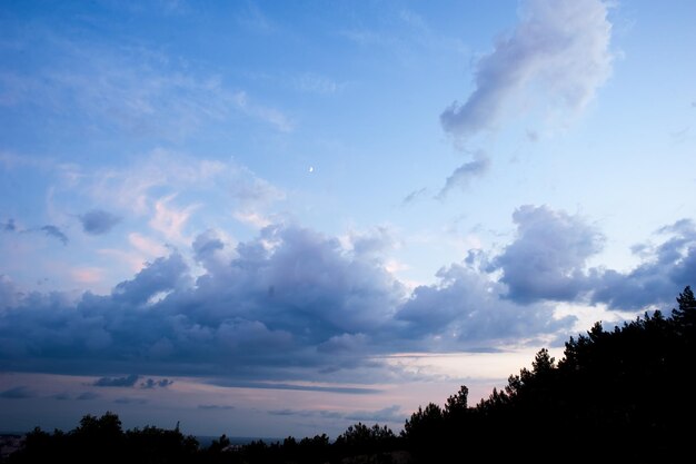 Blue sky the moon beautiful clouds