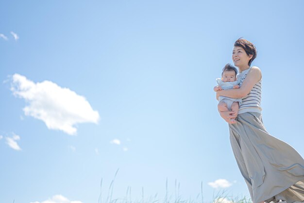 Blue sky and parent and child