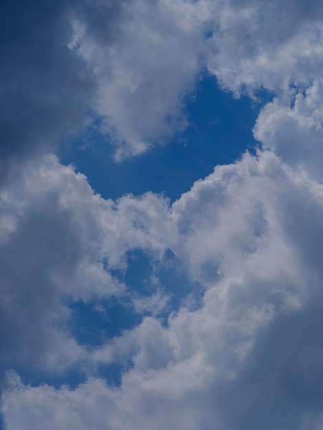 Blue sky and white fluffy clouds