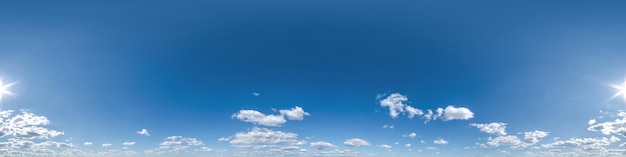 Blue sky with beautiful clouds as seamless hdri 360 panorama
view with zenith in spherical equirectangular format for use in 3d
graphics or game development as sky dome or edit drone shot