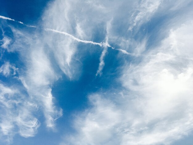 Blue sky with beautiful and fluffy white clouds