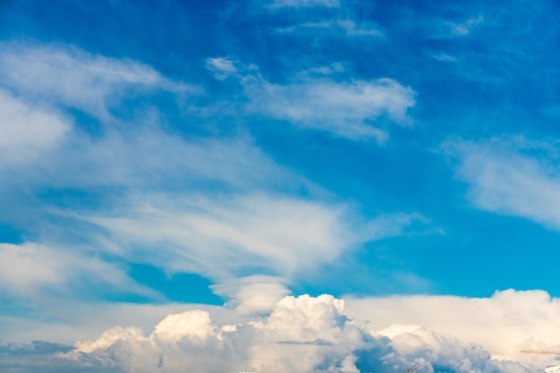 The blue sky with clouds as the blue backdrop in the air The nature of the blue sky with clouds