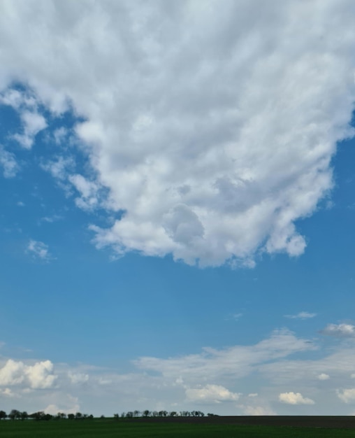 A blue sky with clouds and a blue sky with a few clouds