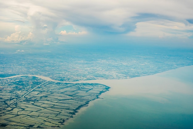 Blue sky with the clouds from the plane view