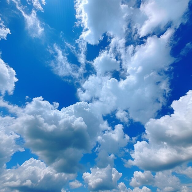 A blue sky with clouds and a white cloud