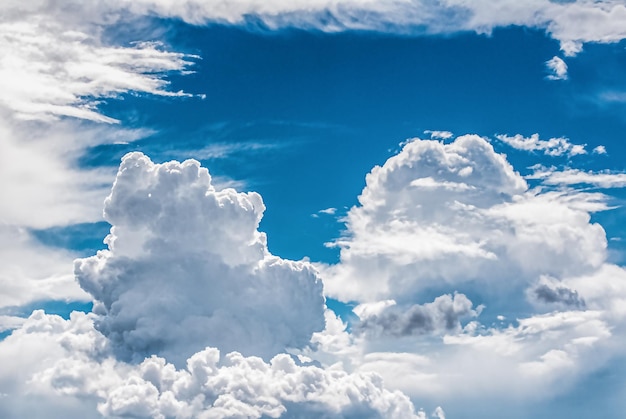 Blue sky with fluffy clouds