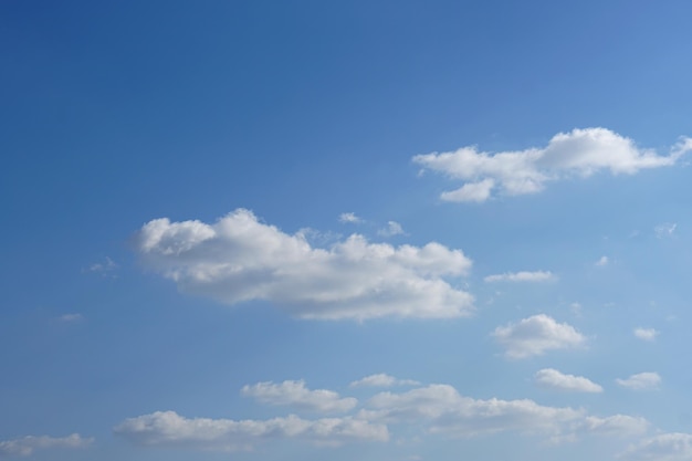 Premium Photo | Blue sky with fluffy white clouds constantly changing shape