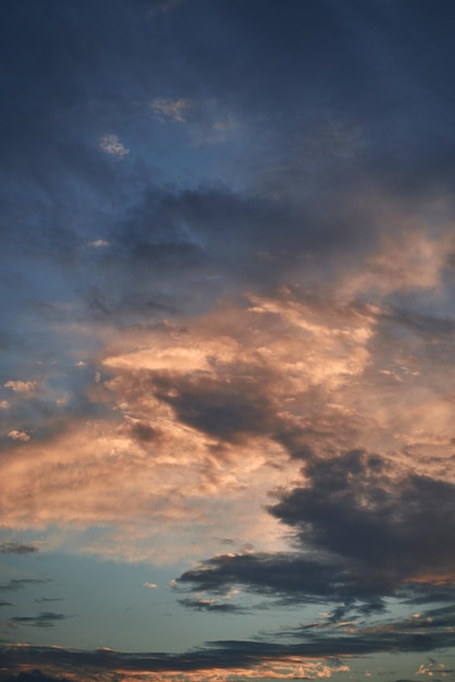 Blue sky with orange and white clouds Teal and orange dreamy color cloudscape background