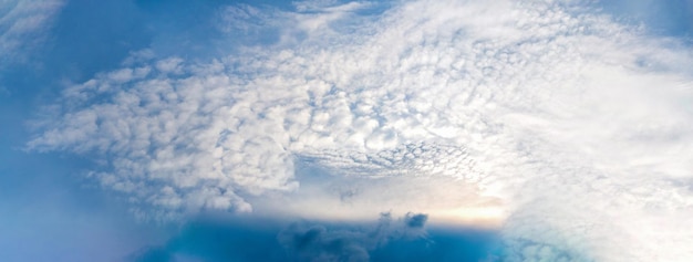 Blue sky with white clouds in the background Panorama