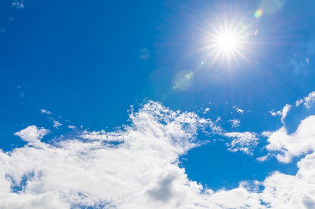 Blue sky with white clouds and sun Beautiful natural background