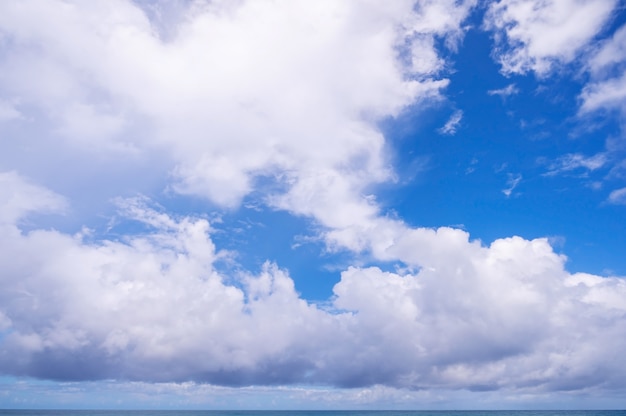 Blue sky with white clouds over tropical sea Nature composition beautiful clouds background.