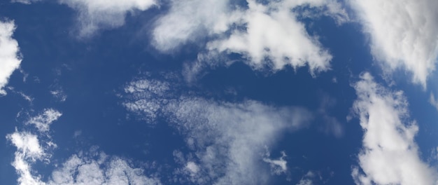 Blue sky with white clouds view up