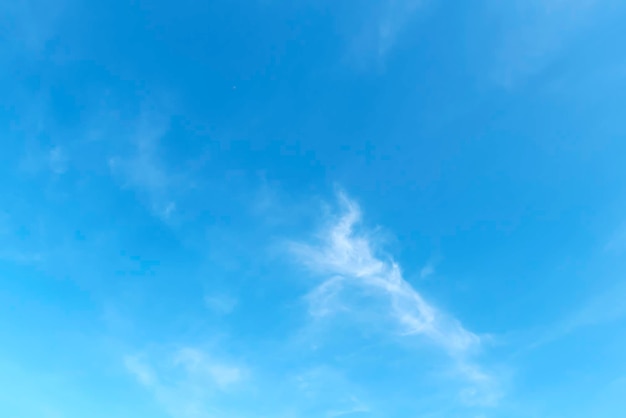 Blue sky with white soft clouds