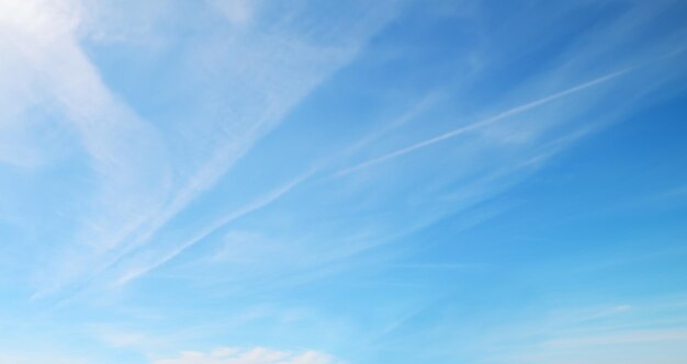 Blue sky with white soft clouds