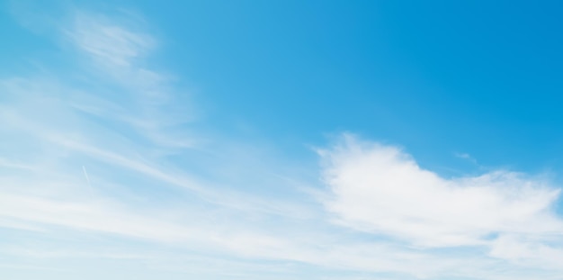 Blue sky with white soft clouds