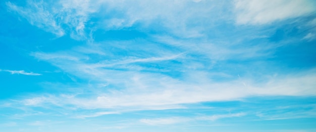 Blue sky with white soft clouds