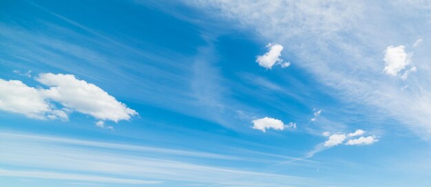 Blue sky with white soft clouds