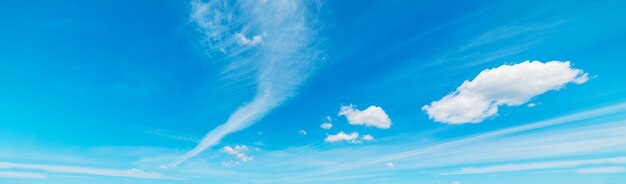 Blue sky with white soft clouds