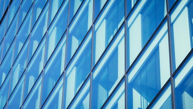 Blue skyscraper out of glass modern office building