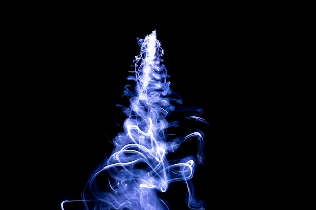 Blue smoke on a black background