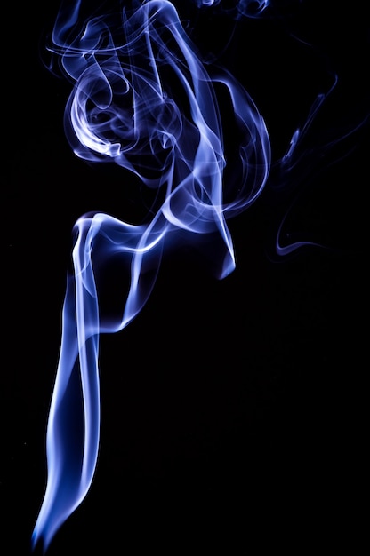 Blue smoke on black