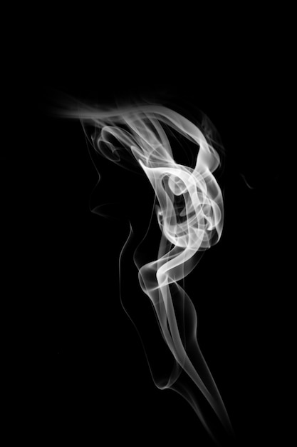 Blue smoke isolated on a black background. template for design