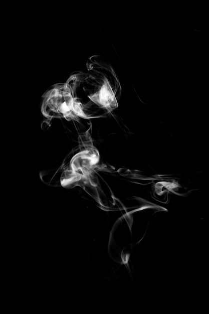 Blue smoke isolated on a black background. template for design