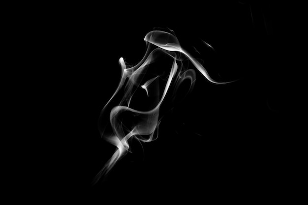 Blue smoke isolated on a black background. template for design