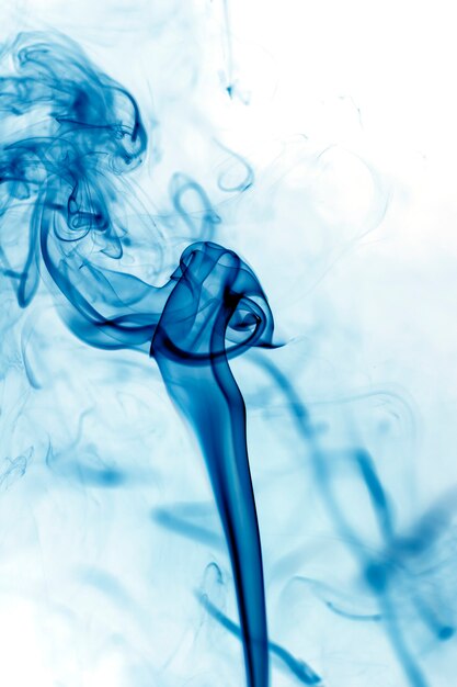 Blue smoke movement on white background.