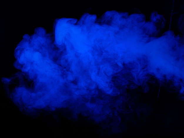 Blue smoke texture on black background