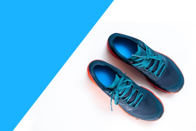 blue sneakers on a white isolated background