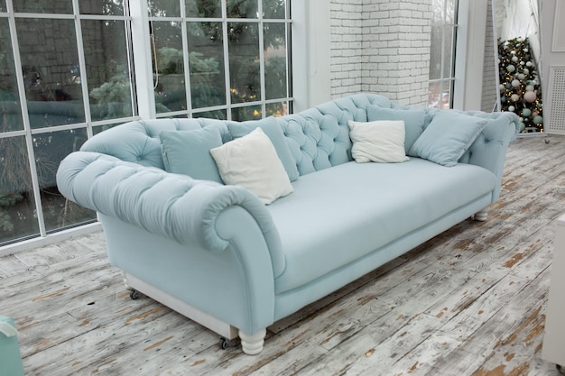 blue sofa. New Year's interior with sofa