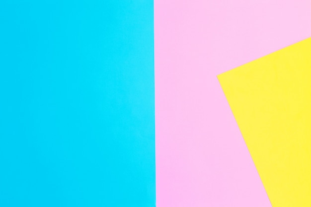 Photo blue, soft pink and yellow paper. colorful texture.