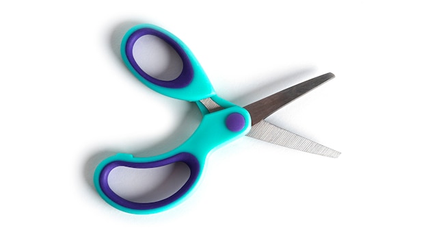 Photo blue stationery scissors isolated on a white background. high quality photo