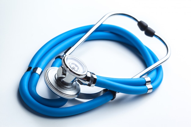 Blue stethoscope isolated on white