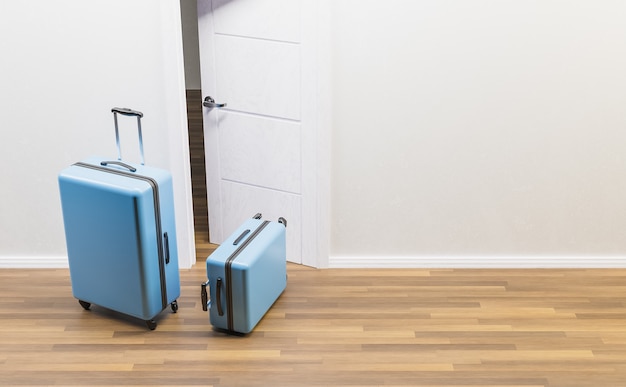 開いたドアと木の床の前にある青いスーツケース。旅行または解放の概念。 3Dレンダリング
