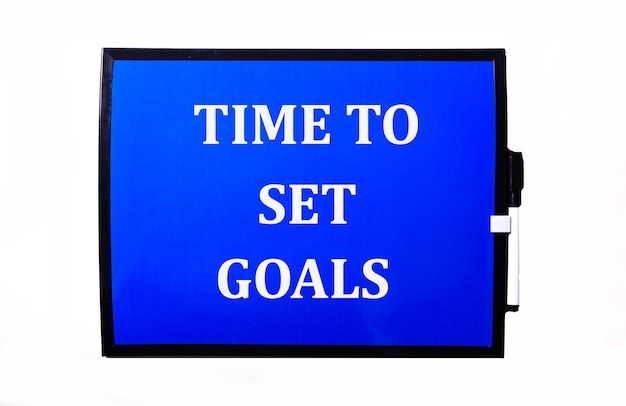 On a blue surface a white inscription TIME TO SET GOALS