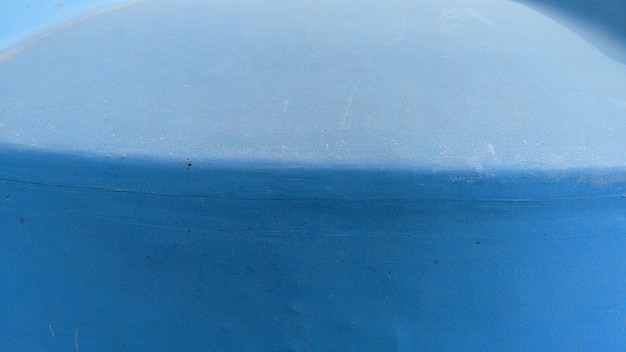 A blue surface with a white line texture