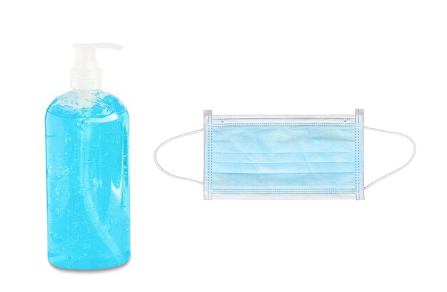 blue surgical or hygienic face mask and alcohol sanitizer hand gel cleaner on white background