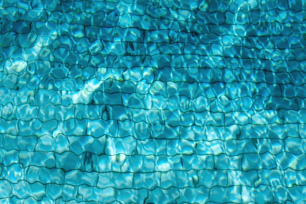 Blue swimming pool water background. 