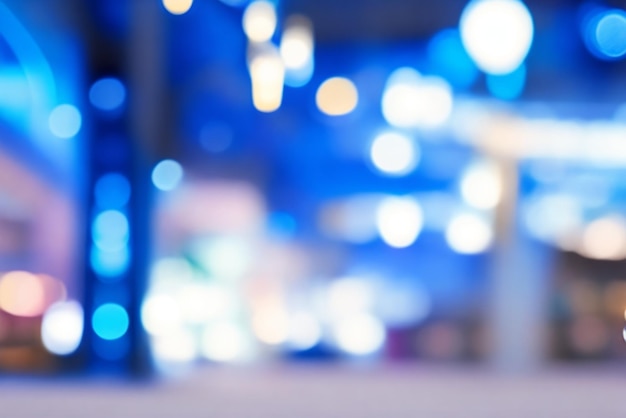 Photo blue tones bokeh background of shopping center with lights blurry image