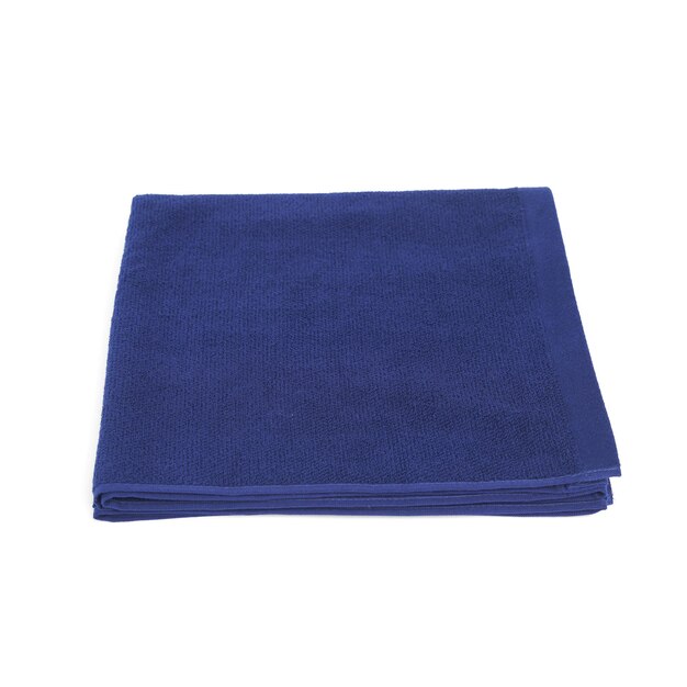A blue towel is folded into a triangle shape