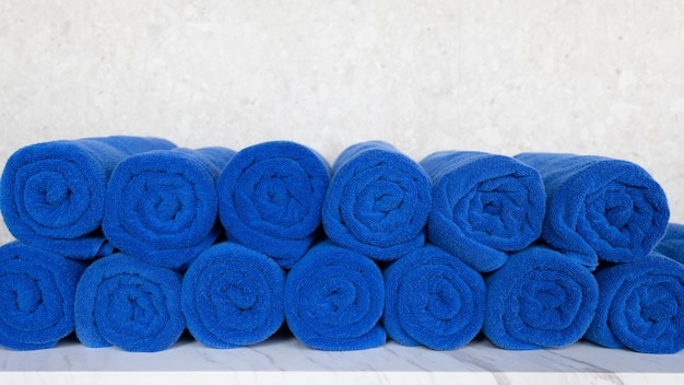 Photo blue towel roll on table