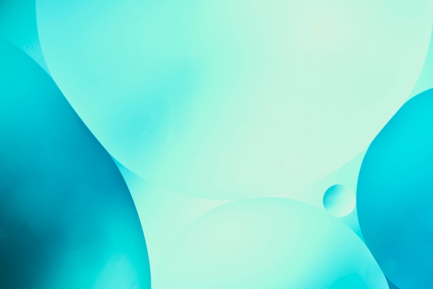 Blue and turquoise oil bubbles background