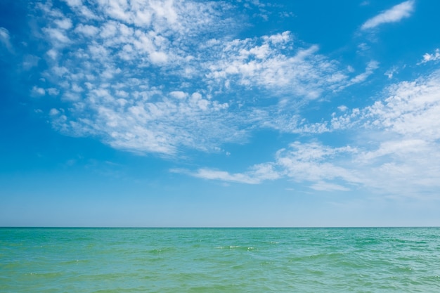 Blue turquoise sea and sky clouds