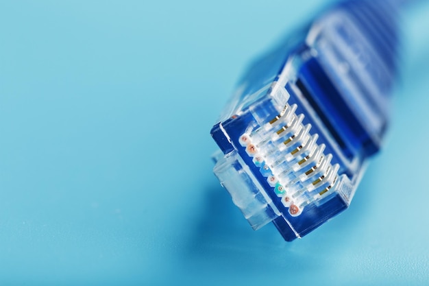 Blue UTP Internet Cable Isolated on a blue background Ethernet Cord