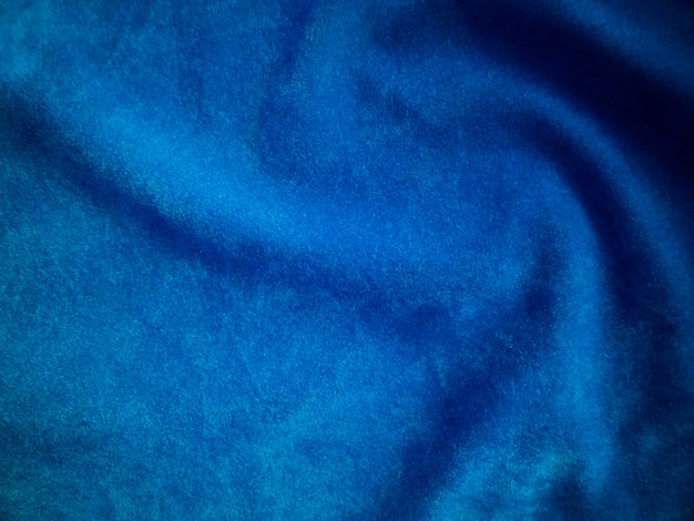 Foto tessuto in velluto blu utilizzato come sfondo sfondo vuoto in tessuto blu di materiale tessile morbido e liscio c'è spazio per textx9