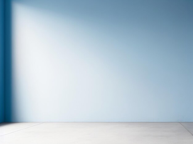 Blue wall in an empty room with concrete floor