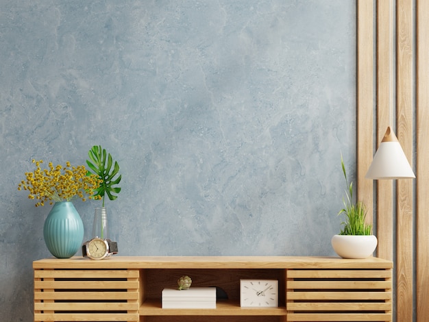 Blue wall mockup in modern empty room on wooden cabinet.3D rendering